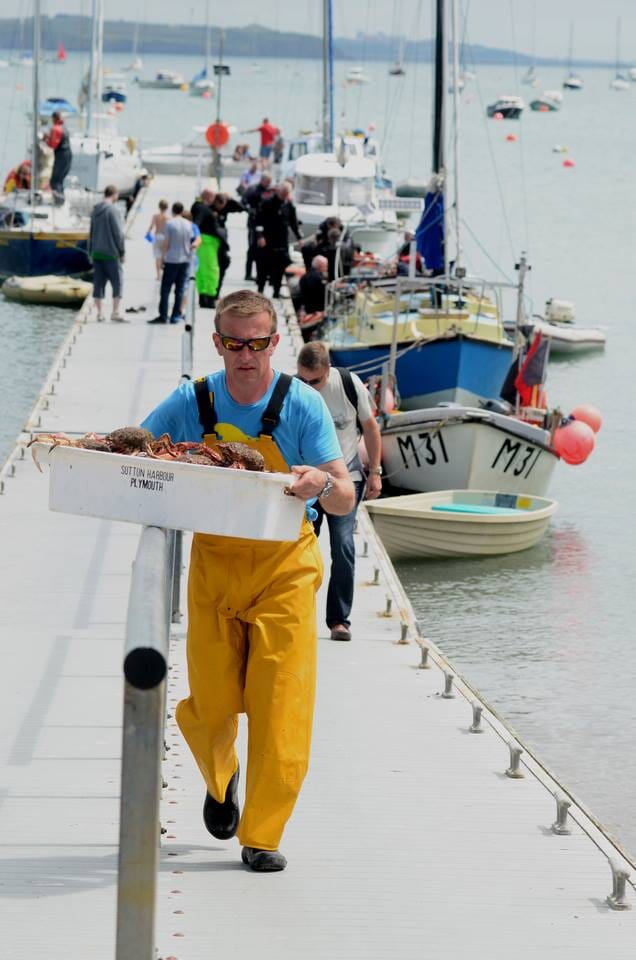 Local fishmern in Dale, Pembrokeshire, bringing in the catch of the day to The Griffin Local fishmern in Dale, Pembrokeshire, bringing in the catch of the day to The Griffin